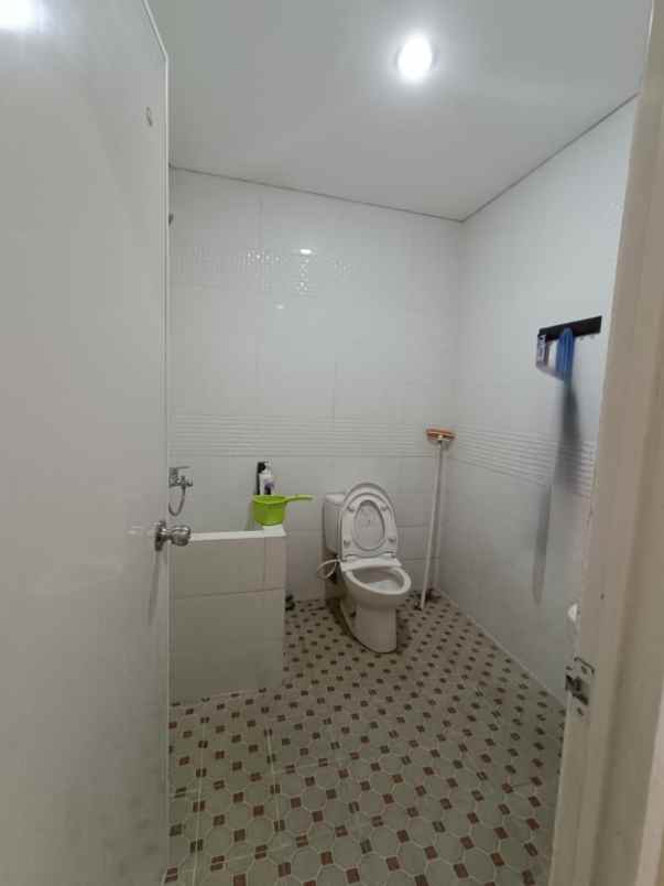 dijual rumah taman wiguna