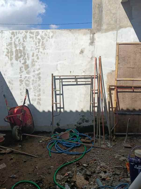 dijual rumah titi bumi