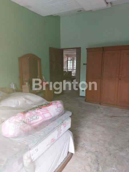 disewakan rumah raya dharmahusada indah