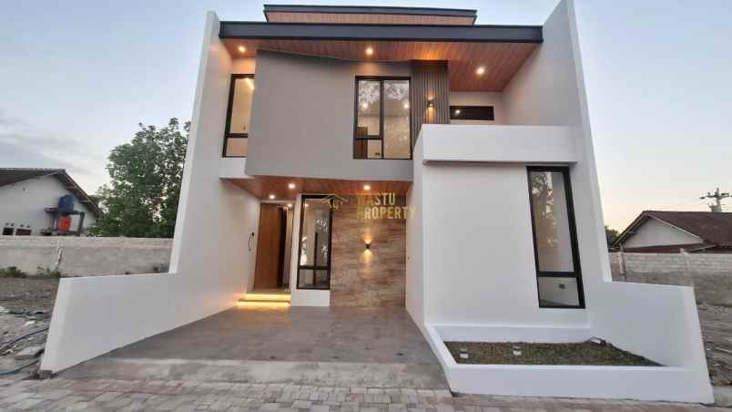 rumah 2 lantai dalam cluster one gate di jogja utara