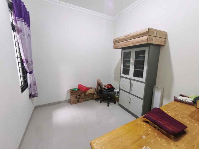 rumah rapi terawat di cluster taman sentani 2 bekasi