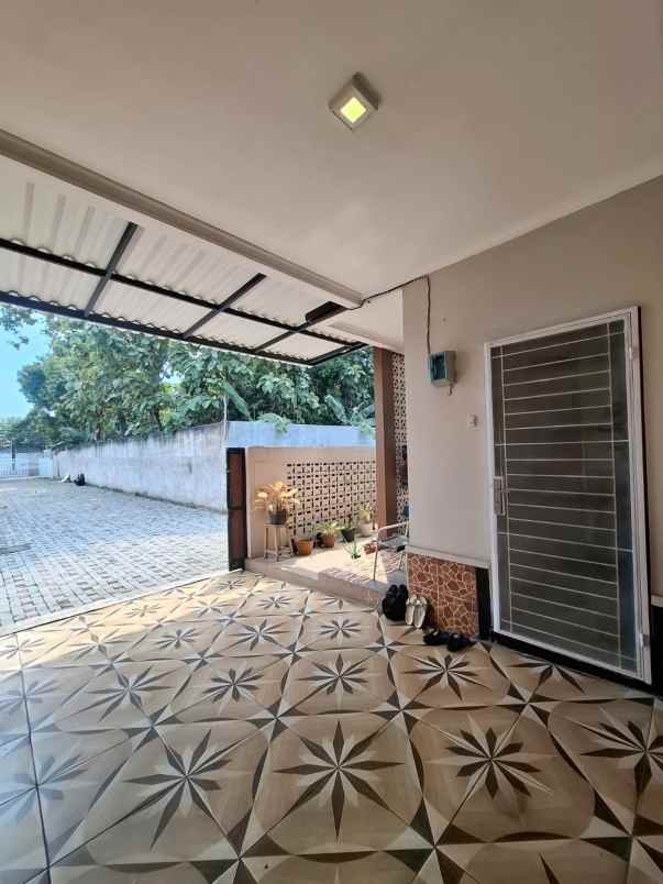 rumah semi furnished dalam cluster di jatimurni bekasi