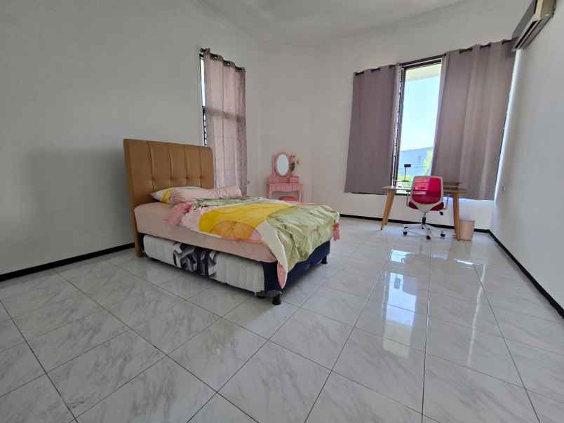 dijual rumah dharmahusada indah