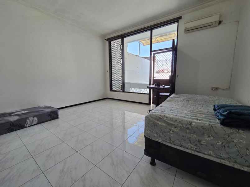 dijual rumah dharmahusada indah