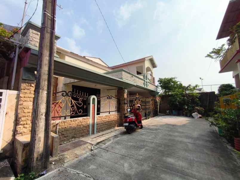 dijual rumah jl surya lestari