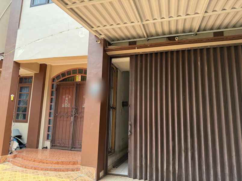 dijual rumah permata buana