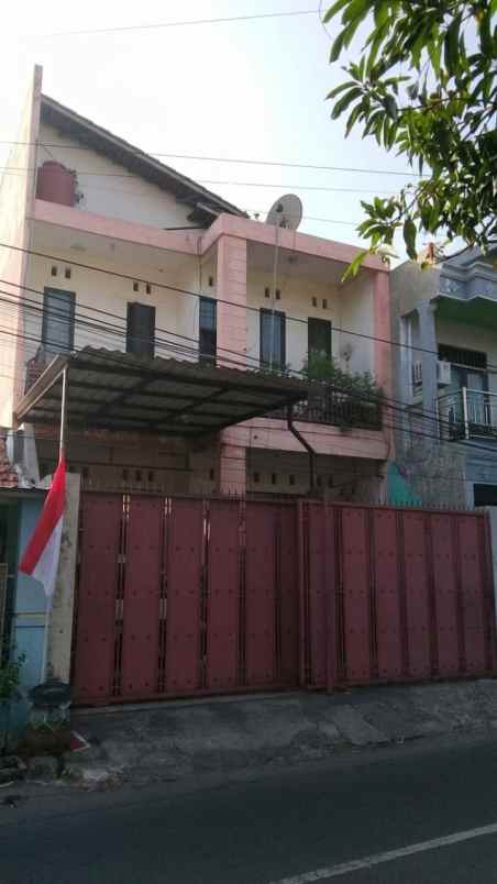 rumah jambangan hadap barat