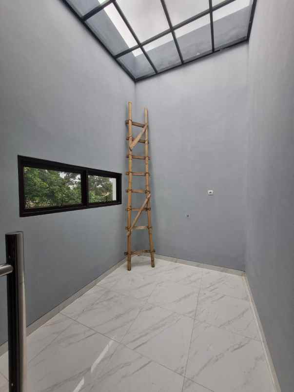 dijual rumah cluster dekat jalan raya