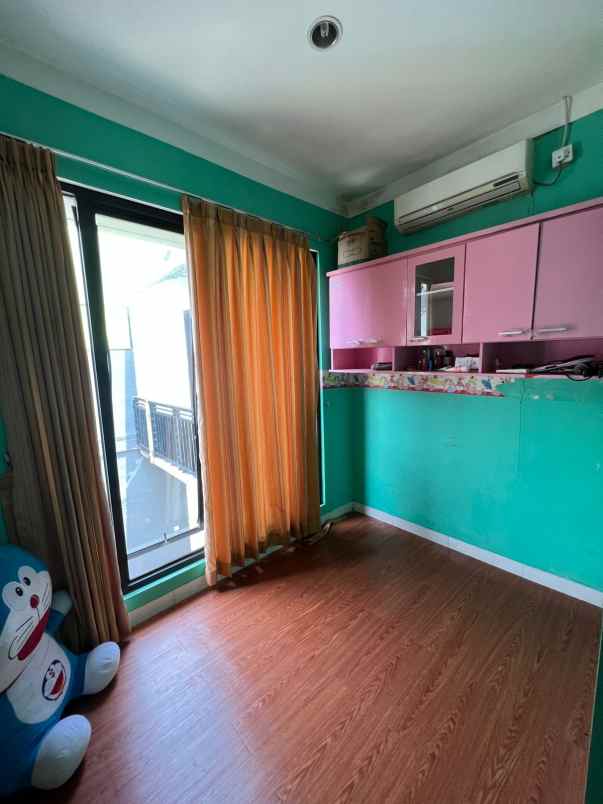 dijual rumah graha raya