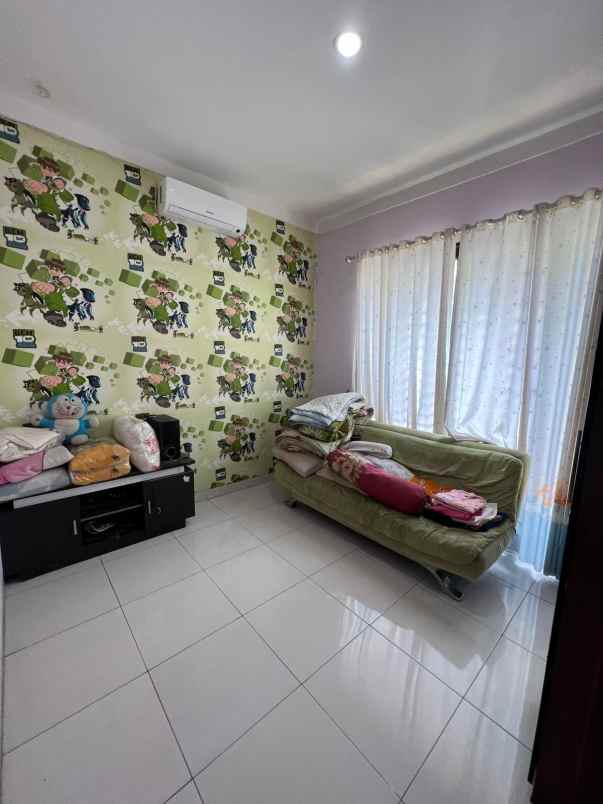 dijual rumah graha raya