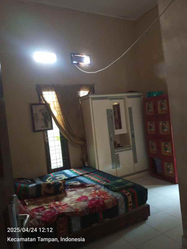 dijual rumah jl garuda sakti km 2