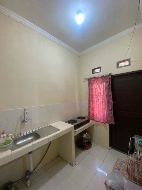 dijual rumah perum kota permata