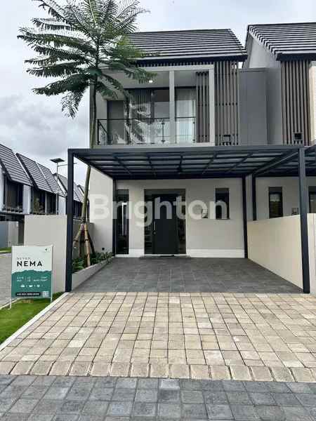 rumah baru amesta living di tengah perkotaan