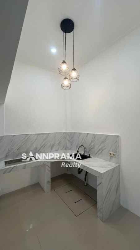 rumah cluster 2 lantai di pamulang tang sel