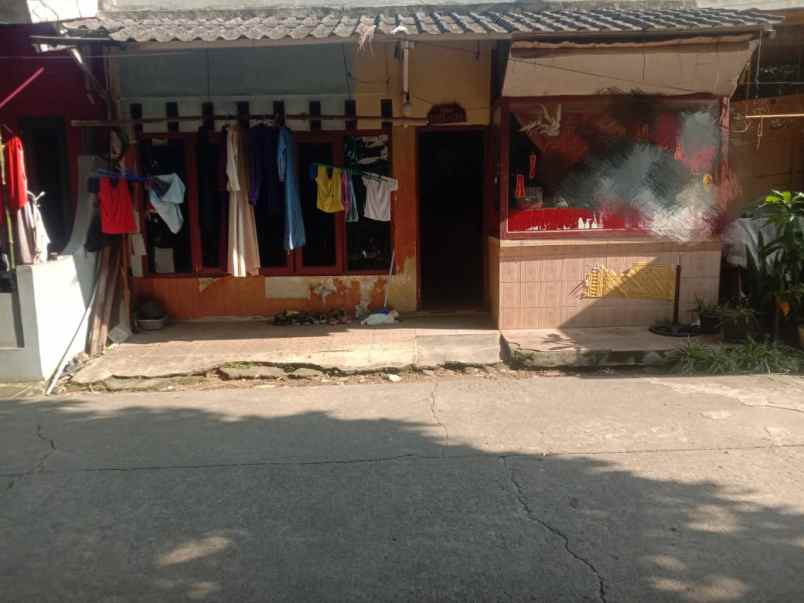 dijual rumah di megaregency blok h 10 no 8