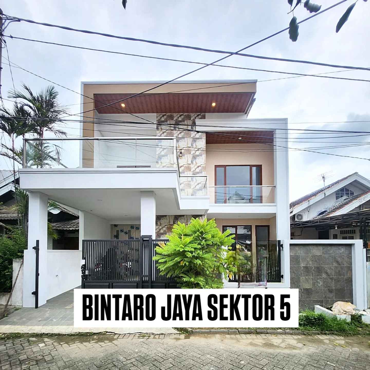 dijual rumah jalan raya boulevard