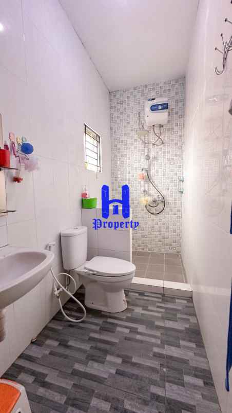 dijual rumah komplek sunggal center