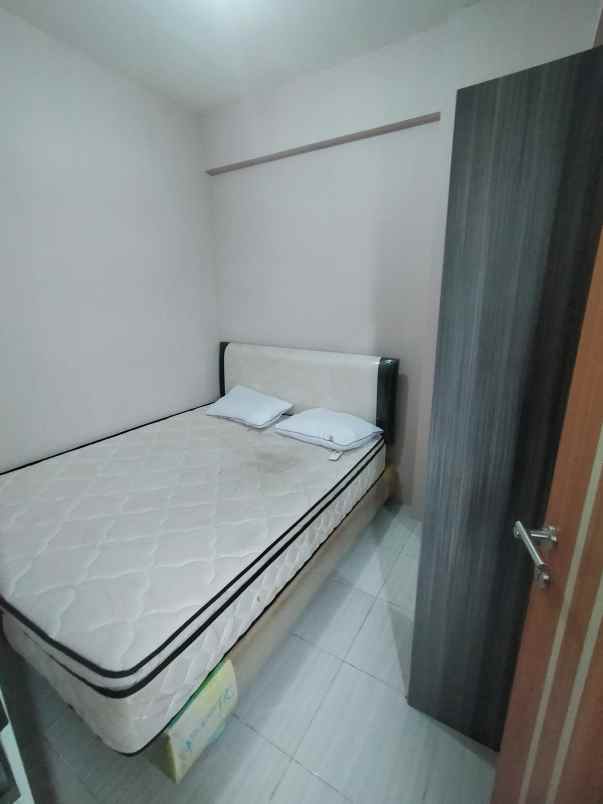 puncak dharmahusada tower b lantai 18 view city