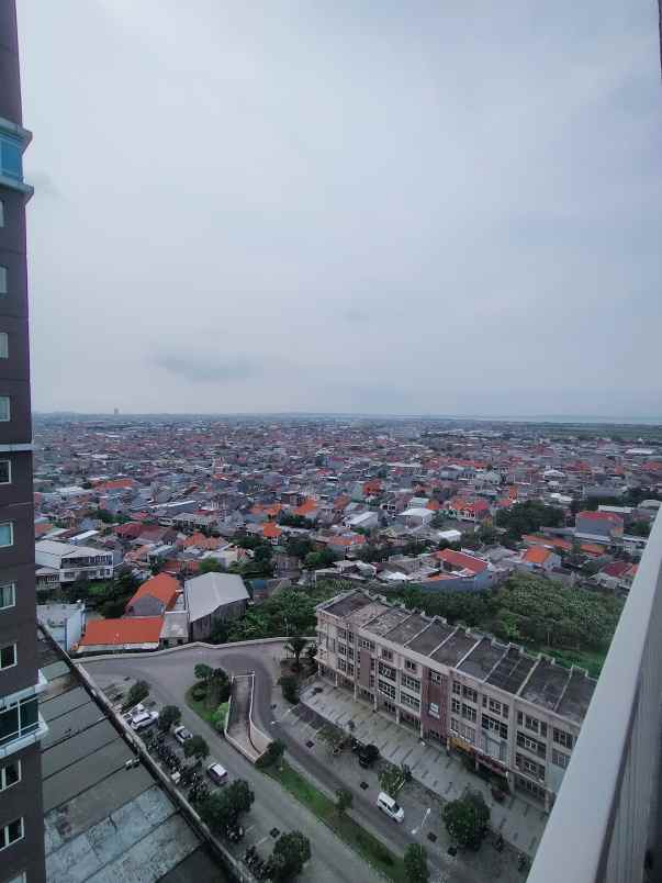 puncak dharmahusada tower b lantai 18 view city