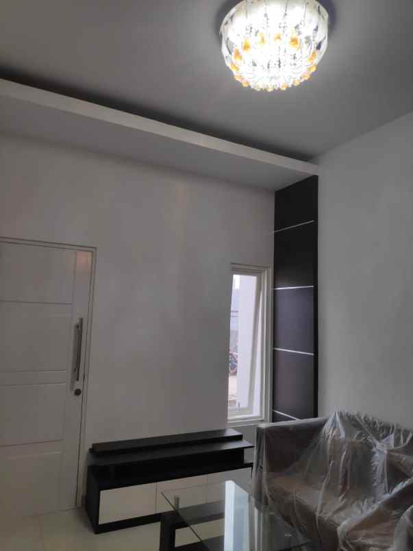 rumah jl jatiwaringin pondok