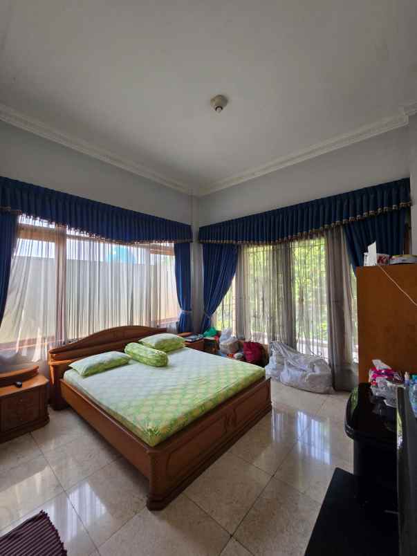 rumah tanah luas akses lebar di pondok kelapa