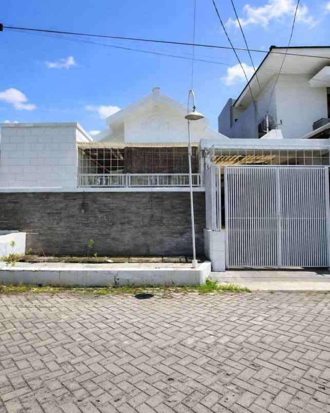 rumah wiguna tengah strategis siap huni