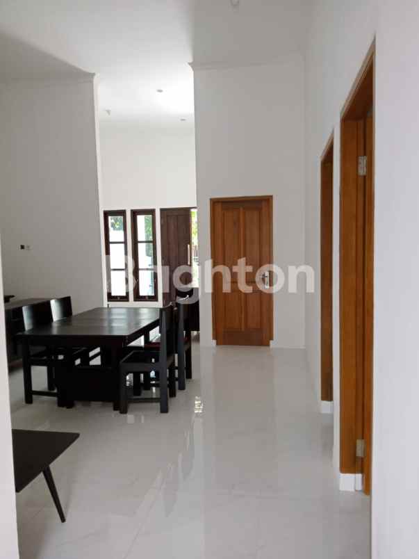 rungkut asri rumah kondisi kosongan harga nett