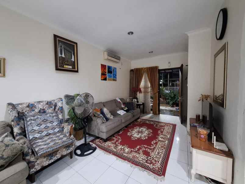 dijual rumah cluster aralia harapan