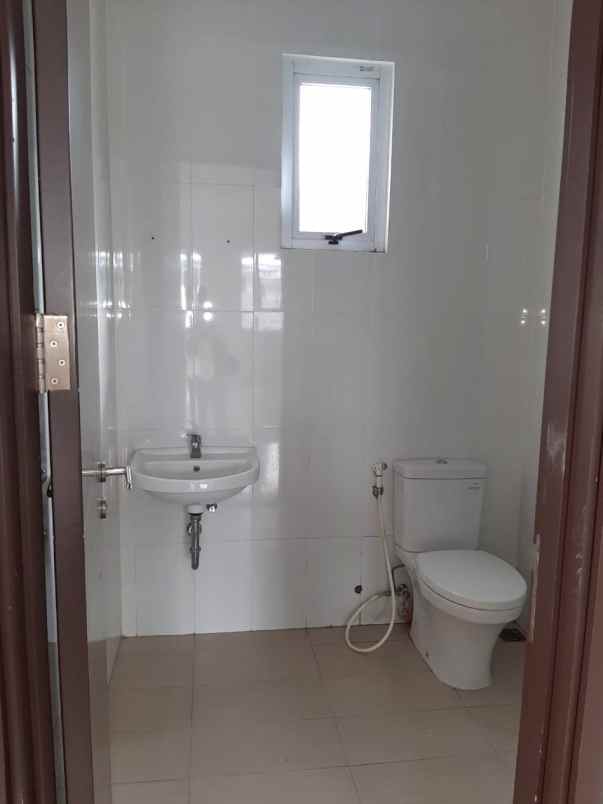 dijual rumah cluster palm spring jgc