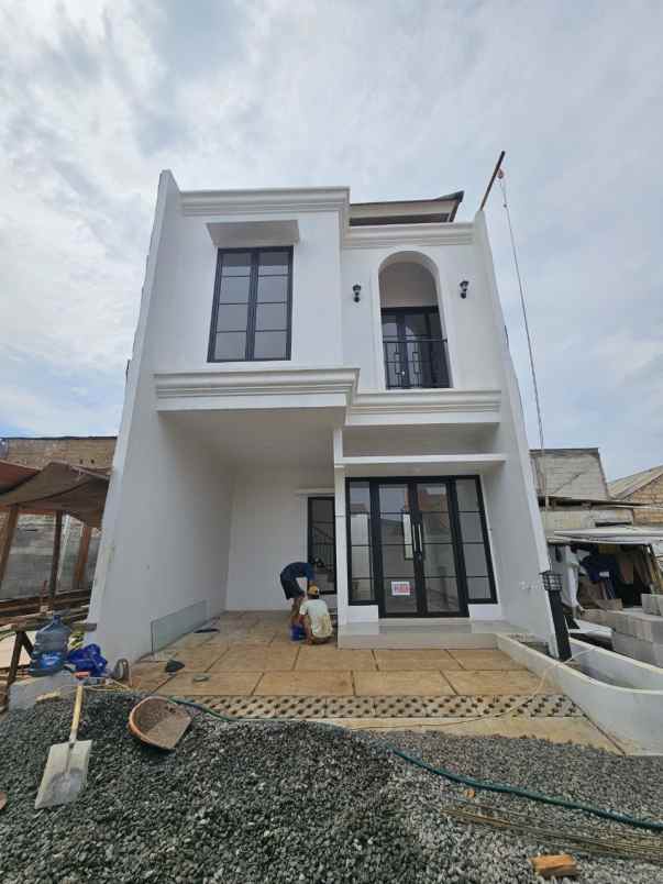 dijual rumah jalan raya merdeka