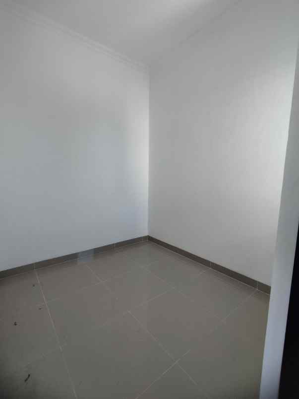 dijual rumah jalan raya merdeka