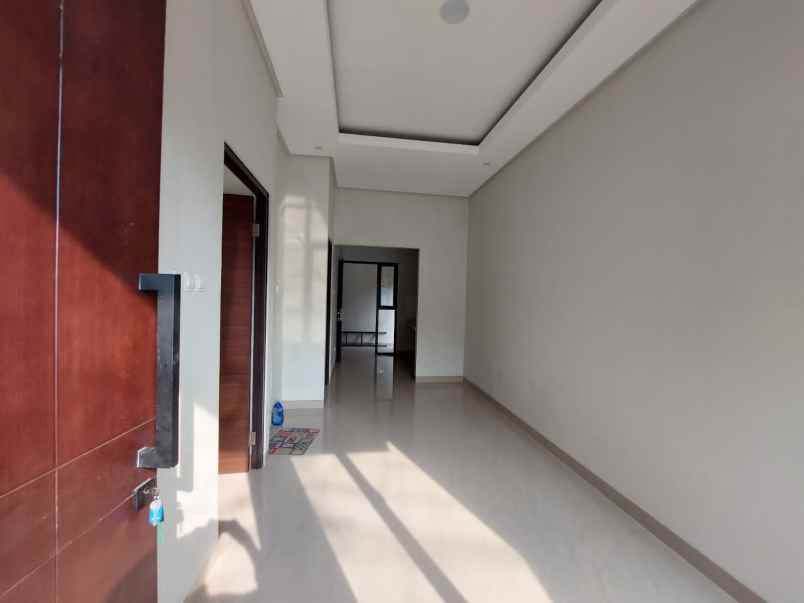 dijual rumah jalan raya paku jaya