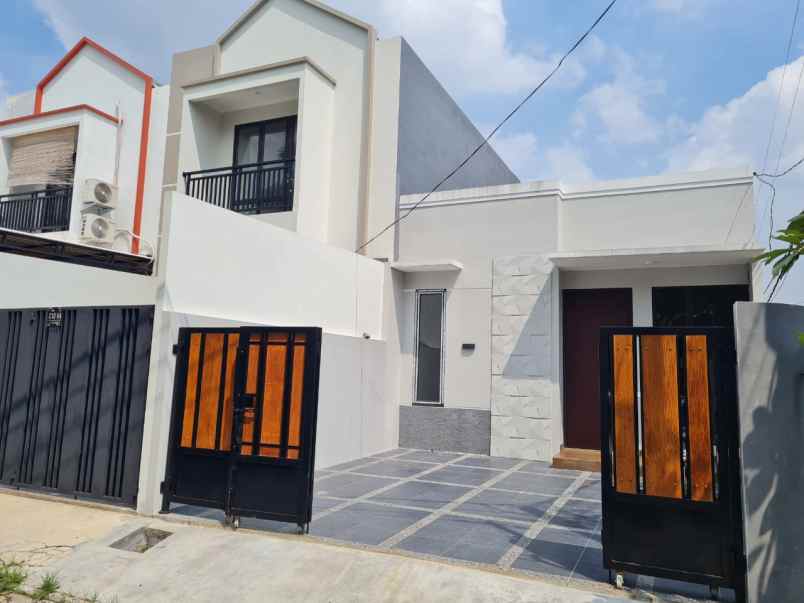 dijual rumah jalan raya paku jaya