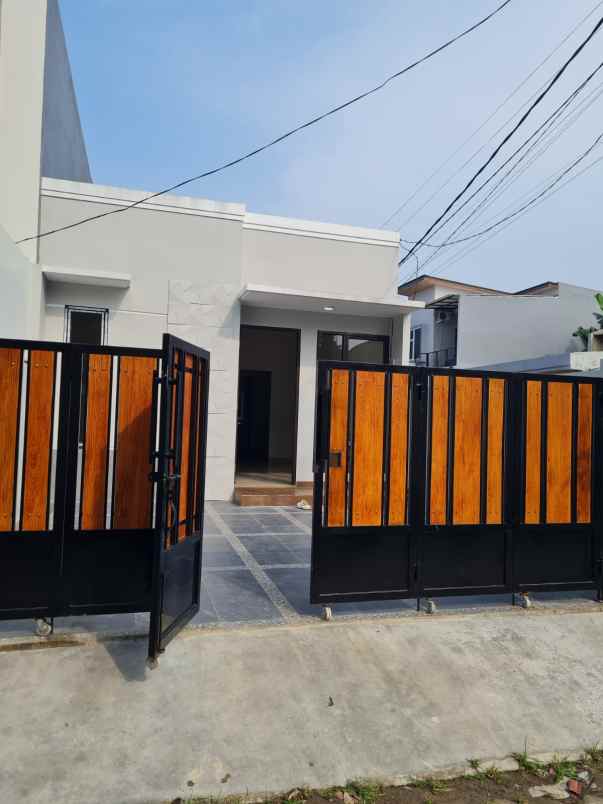 dijual rumah jalan raya paku jaya