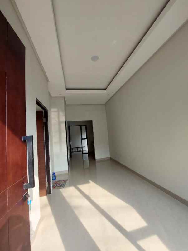 dijual rumah jalan raya paku jaya