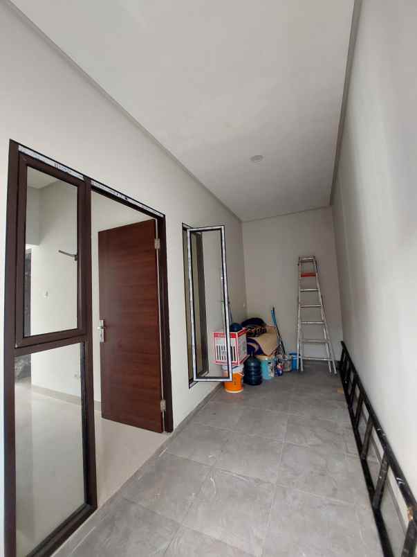 dijual rumah jalan raya paku jaya