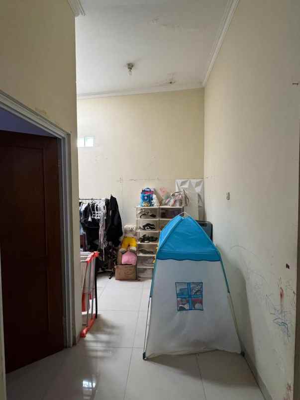 dijual rumah jl raya raden sanim