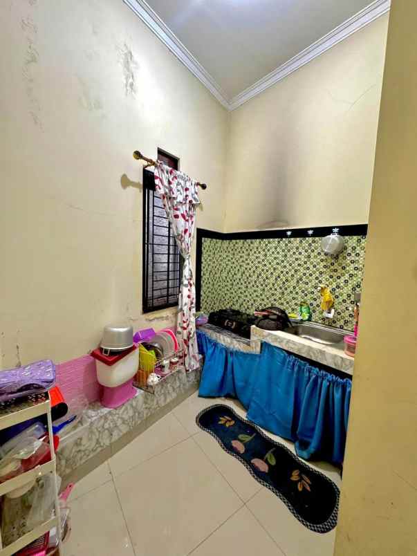 dijual rumah jl raya raden sanim