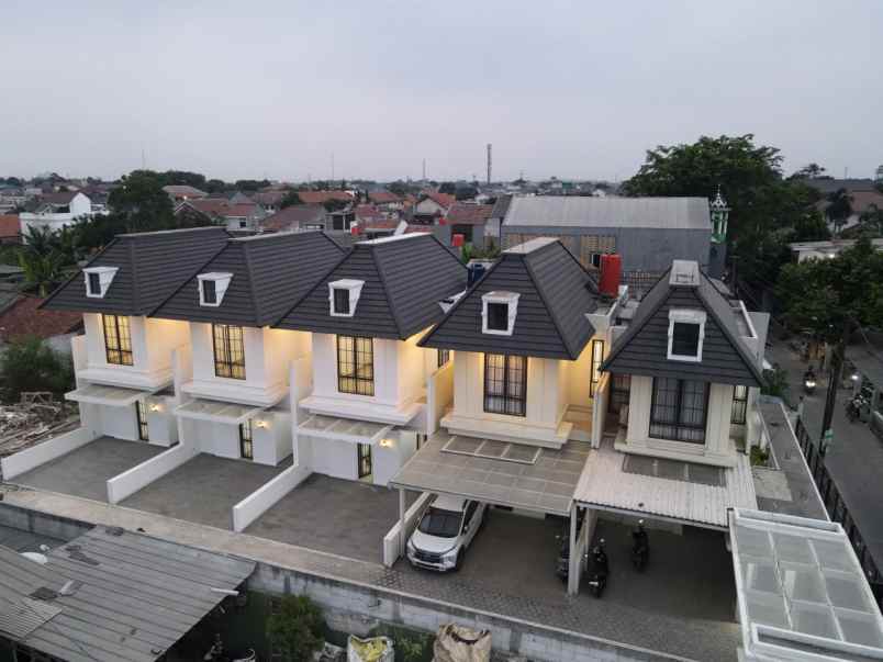 dijual rumah jln h mughni jatimekar