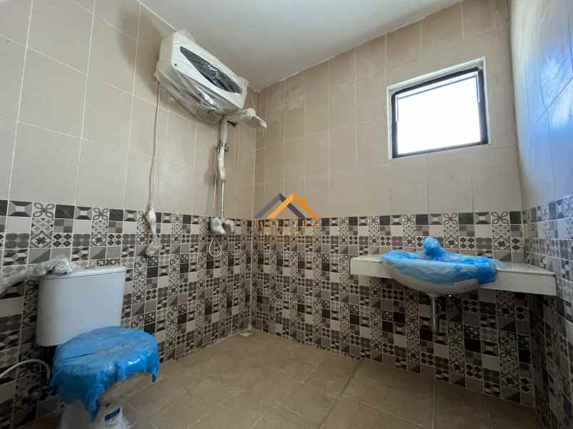 dijual rumah komplek medan resort city