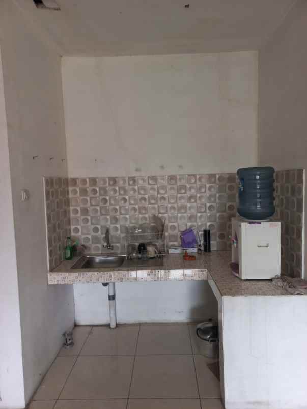 dijual rumah komplek sariwangi