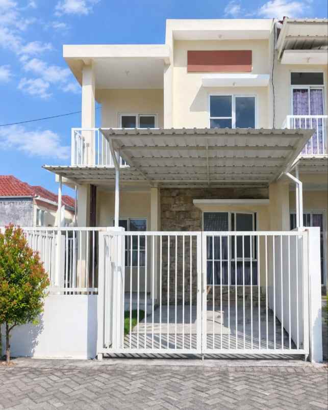 rumah bumi wonorejo asri siap huni carport