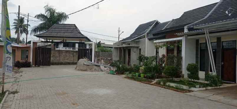 rumah jl lurah madi no 6 kp