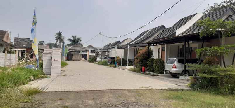 rumah jl lurah madi no 6 kp