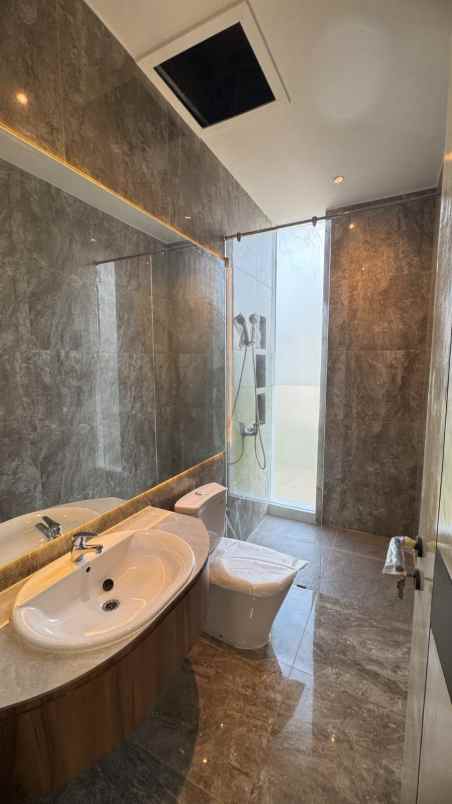 dijual rumah citraland cluster woodland