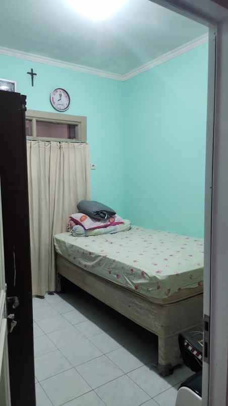 dijual rumah cluster tjikini metland
