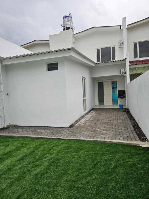 dijual rumah graha green garden