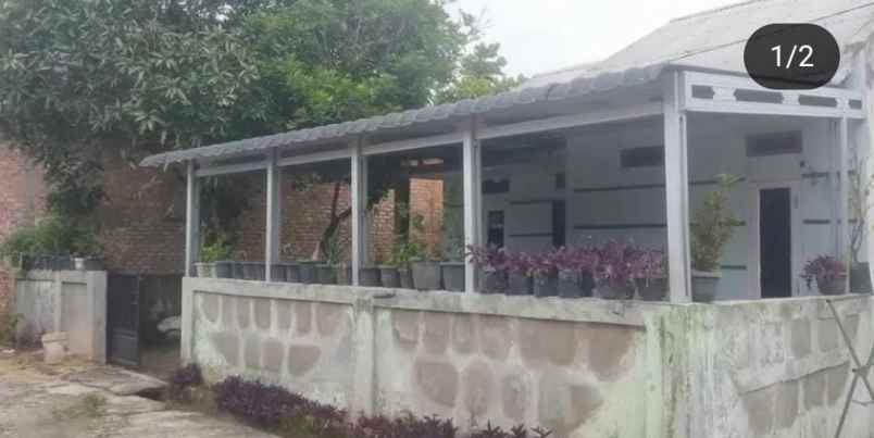 dijual rumah jl muhajirin
