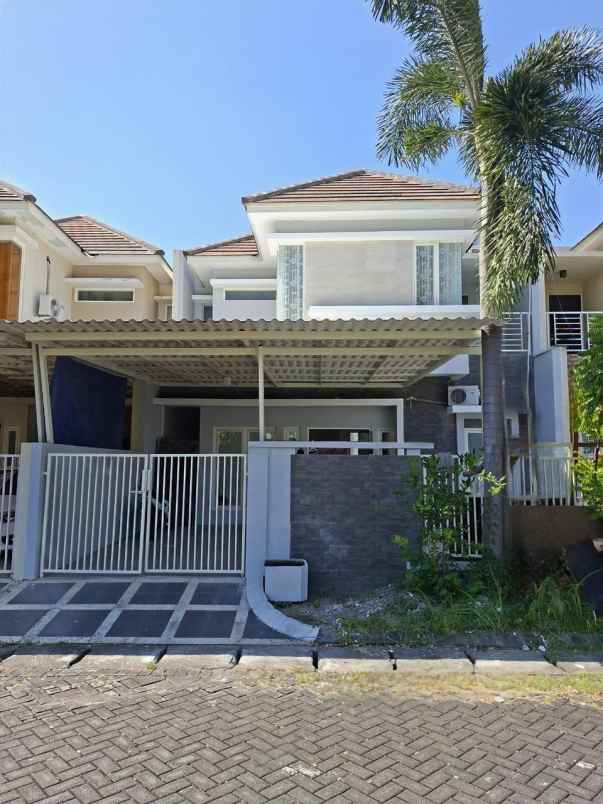 dijual rumah taman rivera