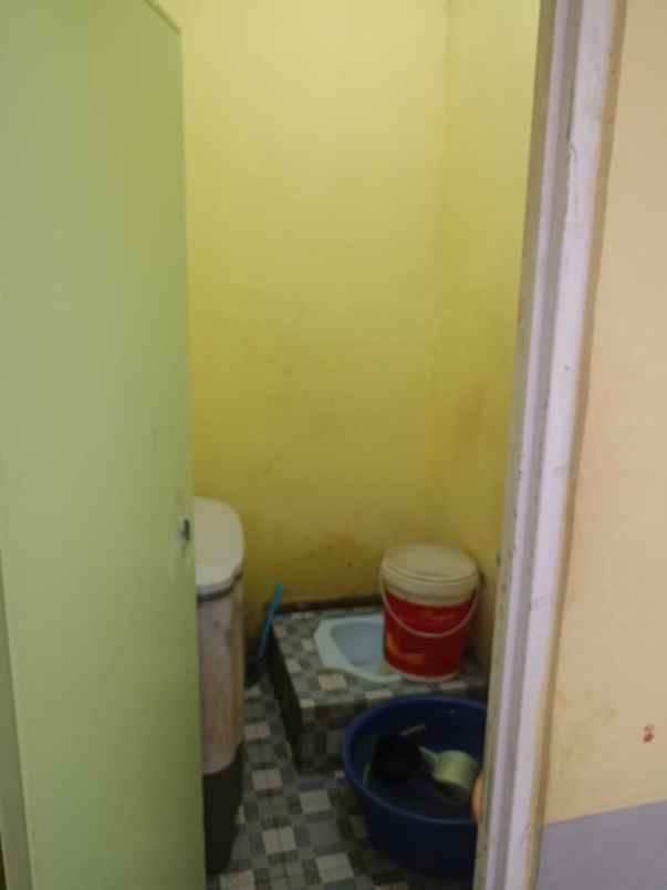 over kredit rumah subsidi jln beringin ujung air hitam